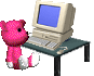 an animated 3d pink bear sitting in front of a computer looking confused